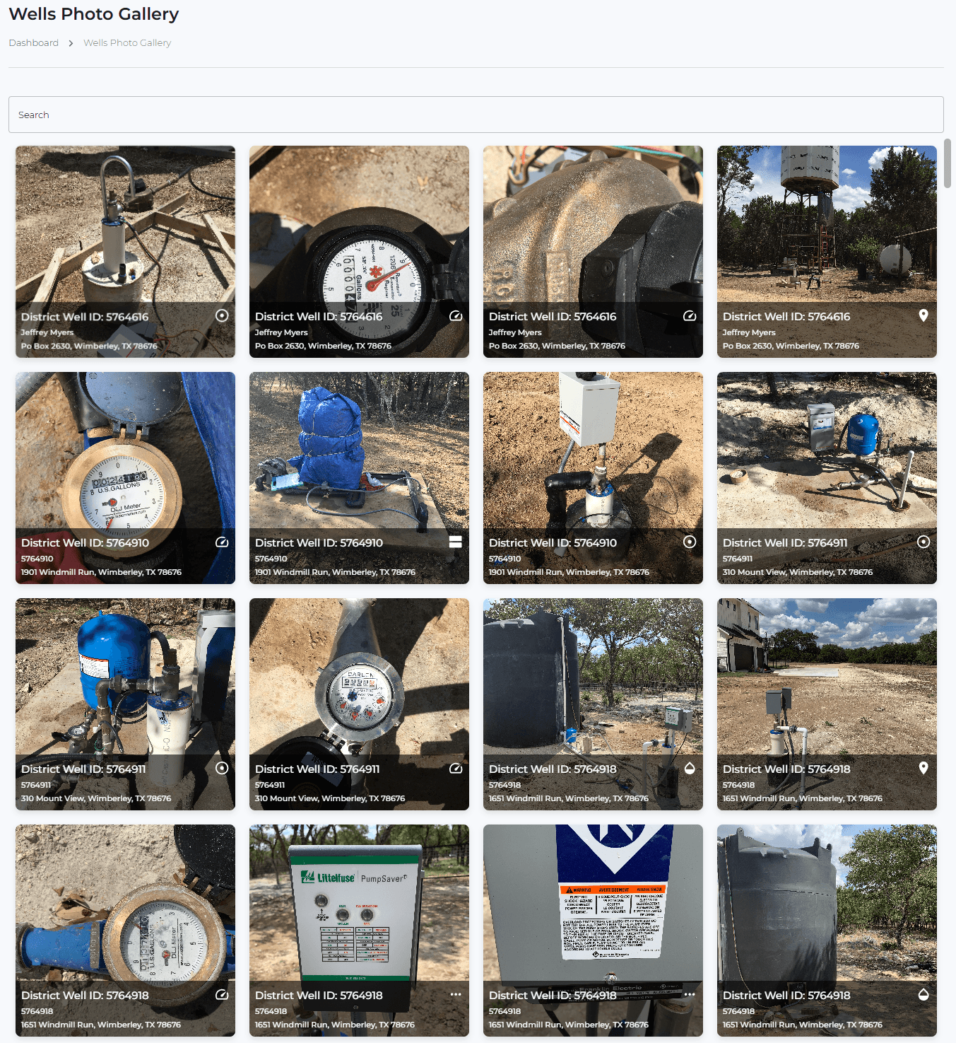 Searchable Wells Photo Gallery - a card grid of field photos for District wells. Each tile is labeled with the District Well ID (e.g. 5764616, 5764910, 5764911, 5764918), the permittee/contact name (e.g. Jeffrey Myers) and the site address in Wimberley, TX. Photos document well infrastructure: meters, well heads, telemetry/sensor enclosures, storage tanks and equipment/chemical labels. A search bar sits at the top and each card carries a type icon (location pin, document, etc.). Demonstrates site/asset photo documentation linked to well records.